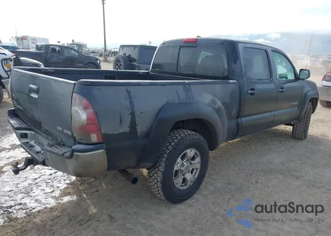 2009 Toyota Tacoma Base V6 из США, поврежденный, VIN 3TMMU52N29M012947